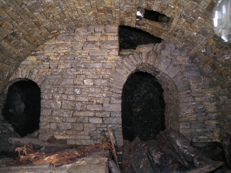 bh_comprearwall2.jpg - View of the rear wall. The hole in the roof and the missing stonework from above the arch are the only sign of deterioration.