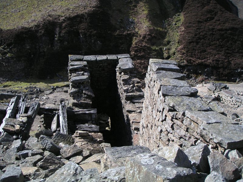 bunton_building.jpg - Looking down into the wheel pit of the water powered crusher for Bunton Level.