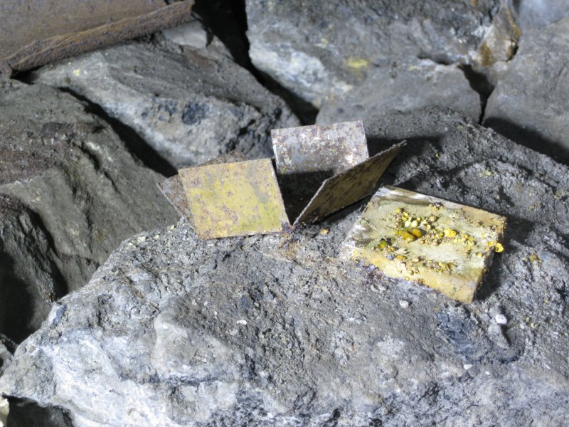 09_archer_stope_det_tins.jpg - Detonator tins, the brass lid still shiny after all these years.