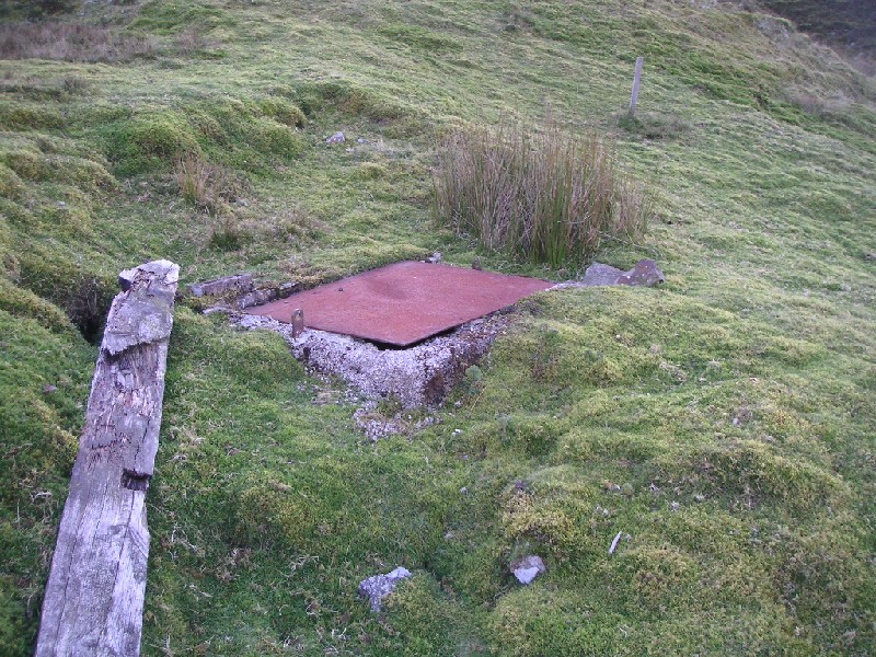 cch_manhole.jpg - Man hole cover for access to the spillway, about 10m or so form the main adit.