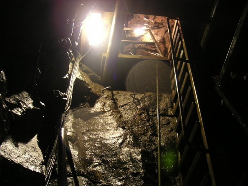 cl_ladderstocarvernflat.jpg - This is the ladder way which climbs up to Cavern Flats workings. This is as far as the East of Nent Level goes in the show mine. A dam has been built pass this to divert the flow of water.