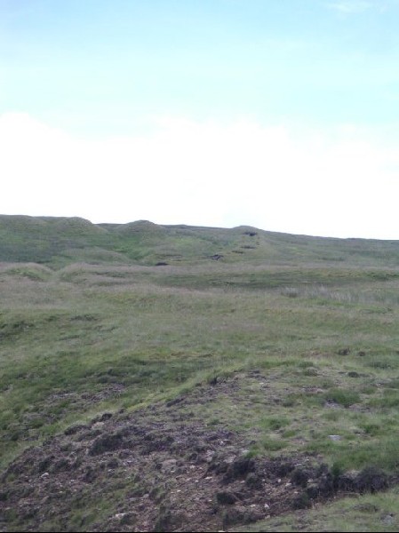 flue1.jpg - The adit like remains of the flue can be seem progressing up the moor.