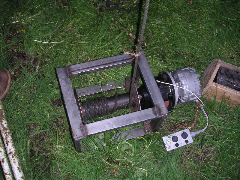 winch_230406_4.jpg - We did our winch test with a pully over the branch of a tree. When the current consumption was being measured it was discovered that when you lower someone with it in 'free wheel' mode, the motor generates a current and can charge the batteries - a big bonus, the charge current was 7A.