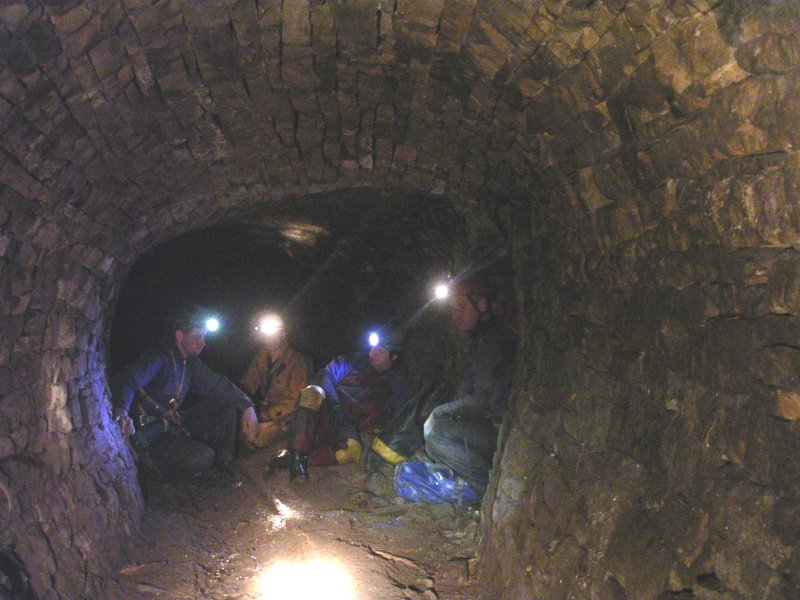 sc_carrsxv_aftercollapse.jpg - When you pass the collapses you pop out into quite good passage way again. Pete is sat in the rise which leads upto a working above.