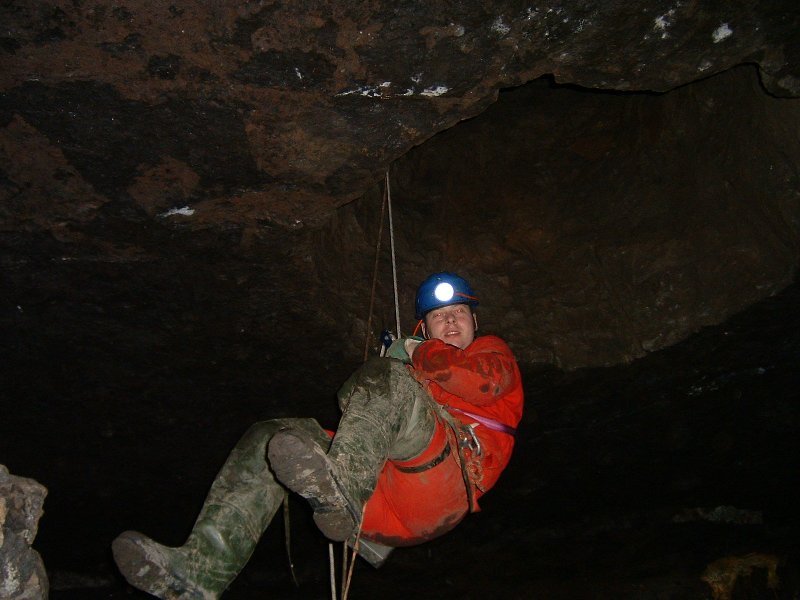 sc_abseil_into_proudsworking.jpg - Coming out of the second shaft through the roof, into the workings below Proud's sump.