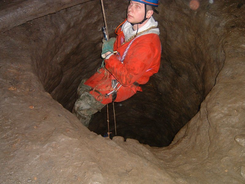 sc_abseilintoprouds_sump.jpg - Preparing to abseil down.