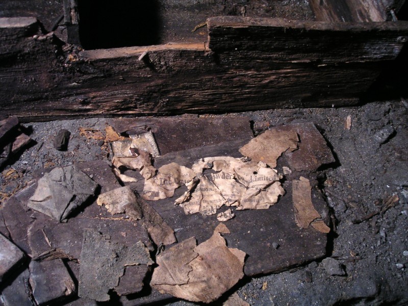 sc_sublevel2_boxesBwrappers.jpg - Close up of the explosives wrappers.