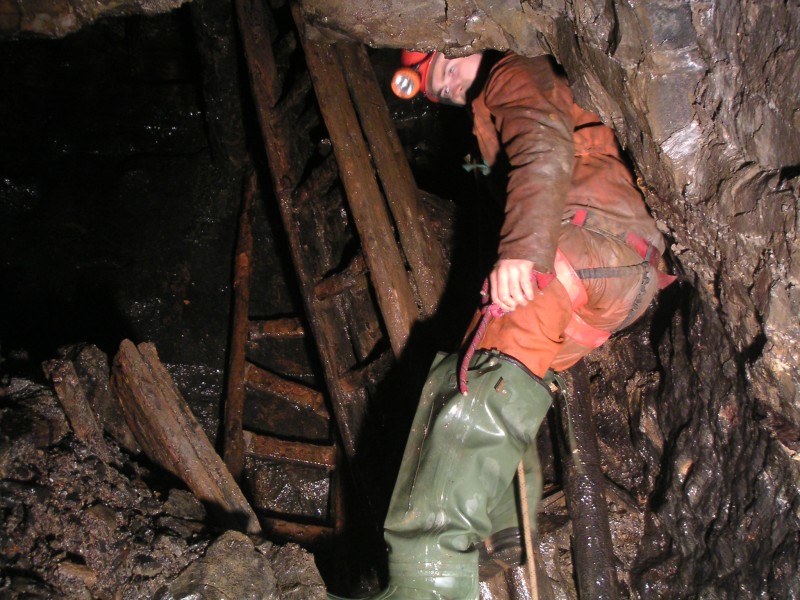 sc_hsbottom_ryangoingup.jpg - Ryan starting his climb back up the shaft.