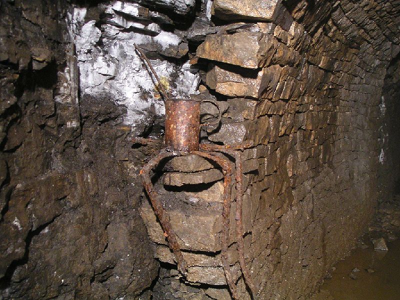 cl_greasecan.jpg - Further in along Carr's Level more artifacts where to be seen, here we have pipe supports and a grease can, with contents still intact.
